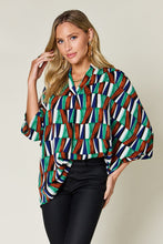 Load image into Gallery viewer, Double Take Full Size Geometric Notched Raglan Sleeve Blouse
