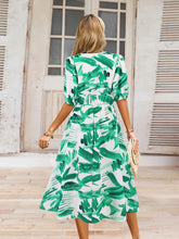 Load image into Gallery viewer, Ruched Printed Surplice Short Sleeve Dress
