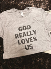 Load image into Gallery viewer, God Really Loves Us Short-Sleeve Tee
